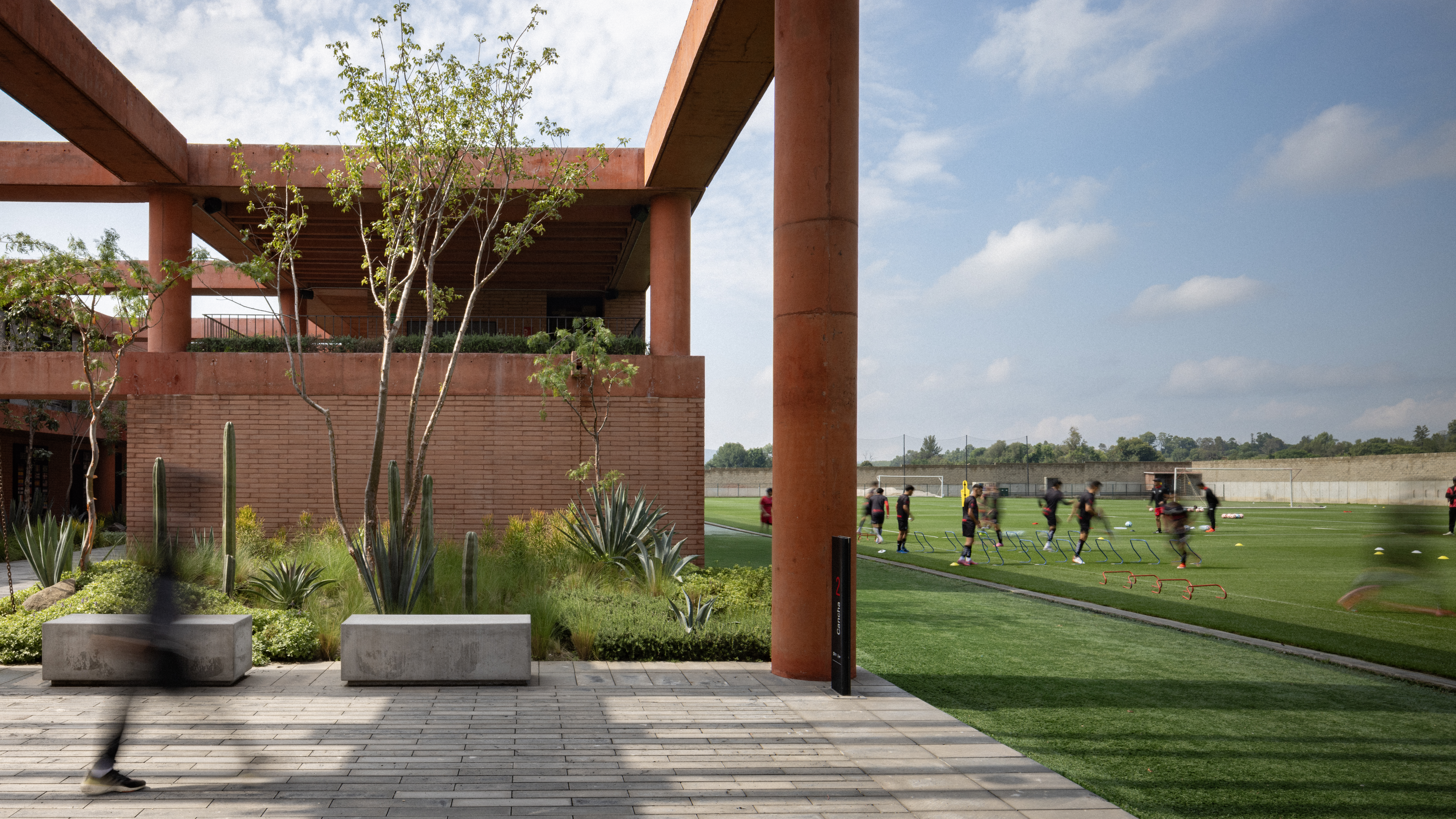 Native planted courtyard alongside training pitch at Academia Atlas FC campus, Guadalajara. By Sordo Madaleno.