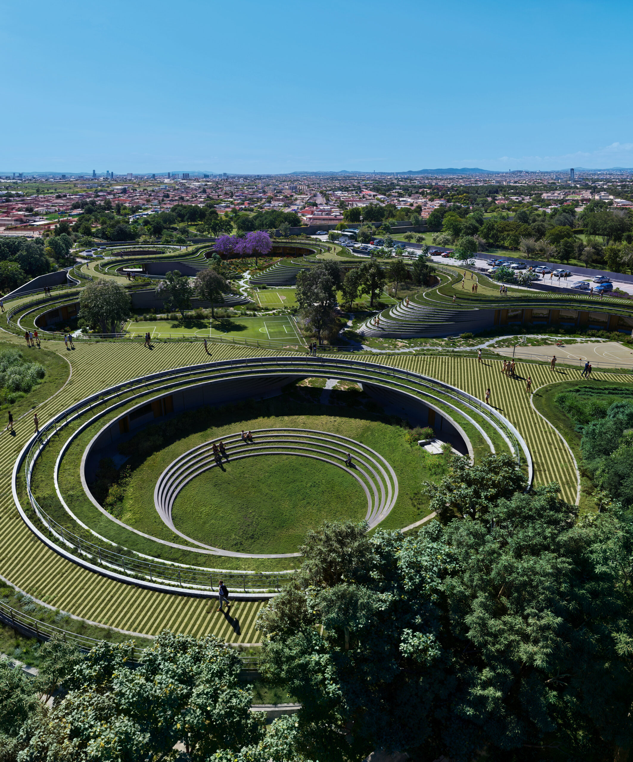 Aerial render of circular terraced landscape masterplan at Canadian School, Cholula, Puebla. Contemporary educational architecture in Mexico by Sordo Madaleno.